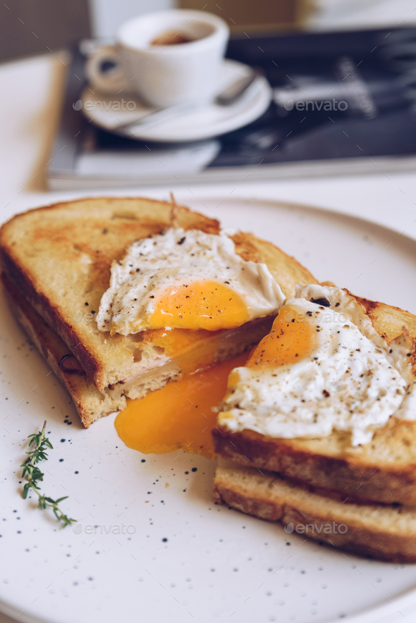 Croque Madame French Toast With Poached Egg Ham And Cheese Stock